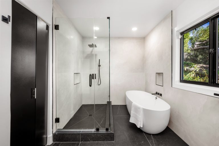 Modern Hollywood Hills home bathroom in Los Angeles, California, with a remodel of an older house