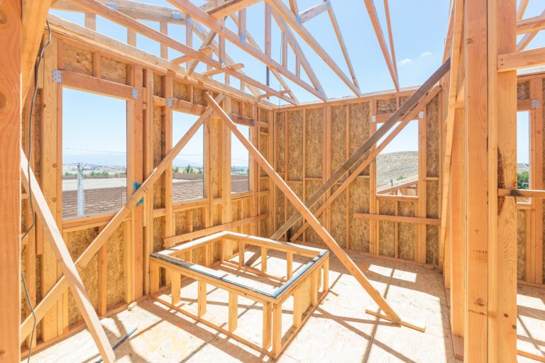Wood Home Framing Abstract At Construction Site.